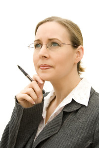 Woman looking into distance whilst thinking